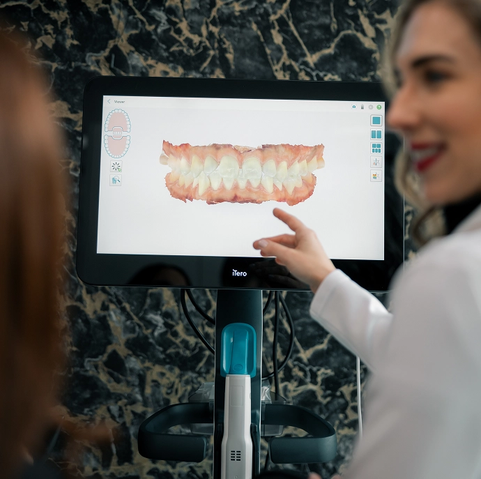 Dr. Yelisbet Fernandez showing invisalign